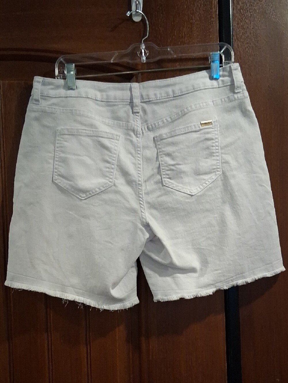 Jennifer Lopez White Denim Shorts with Frayed Hem - Picture 2 of 5